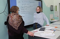 В школе